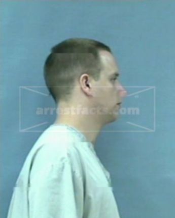 Travis J Merritt