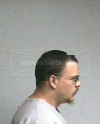 Aaron L Benshoof