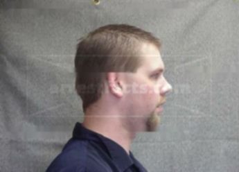 Justin L Hakenson