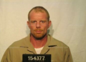 Christopher J Scott