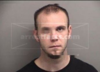 Travis John Cook