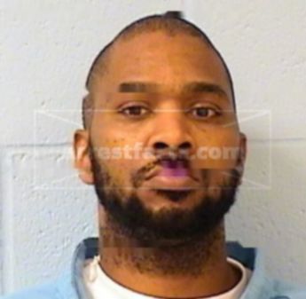 Jamelle E. Travis