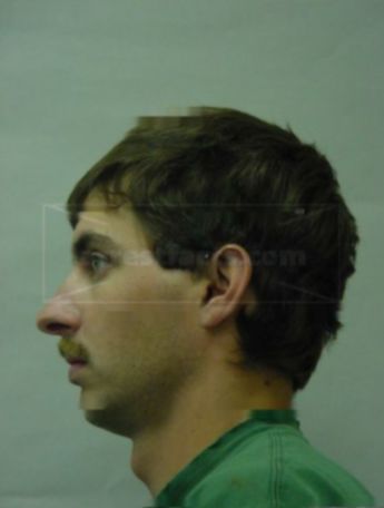 Christopher J Benzow