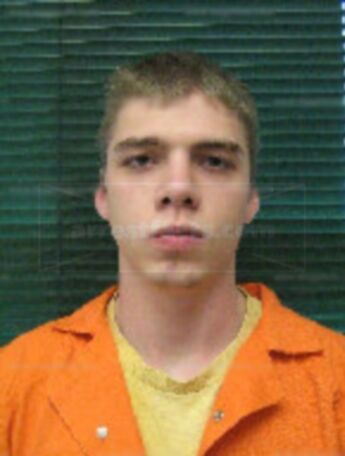 Justin J Baker