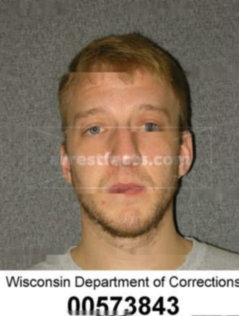 Justin M Kotolski