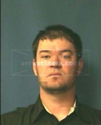 Travis L Gibson