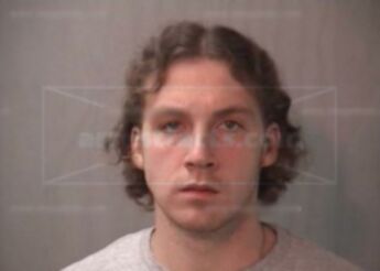 Matthew E Goetz