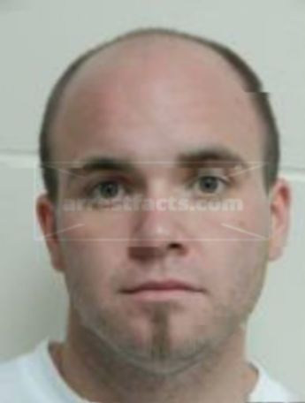 Trevor B Lomison