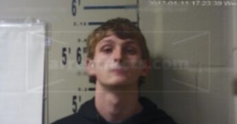 Devin J Riggs