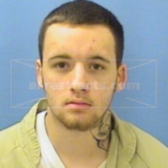 Tyler J. Ozga