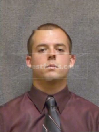 Tyler J Olson