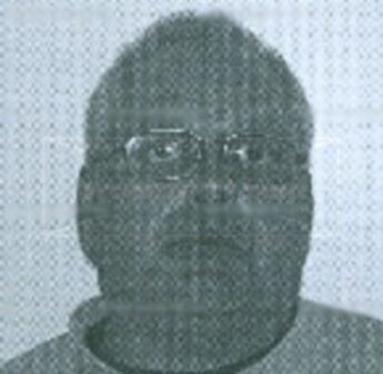 Dennis L. Rhoades