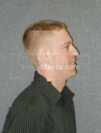 Joshua G Tracy