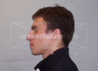 Justin L Mueller
