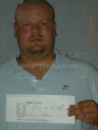 Travis R Madl