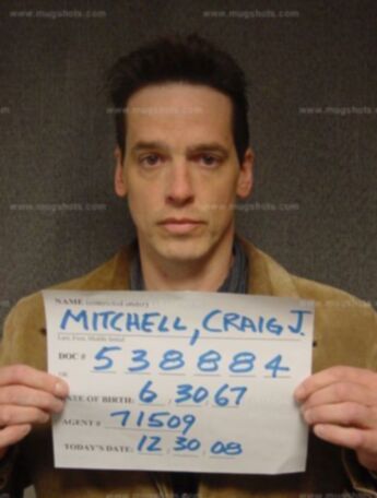Craig J Mitchell