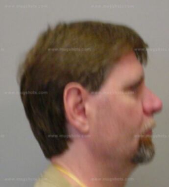Timothy J Kummers