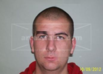 Adam J Kuehmichel