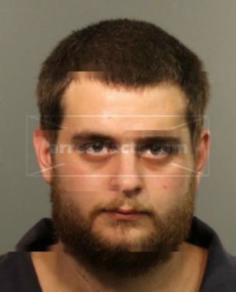 Justin M Polk