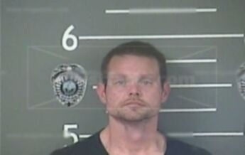 Benjamin J Tackett