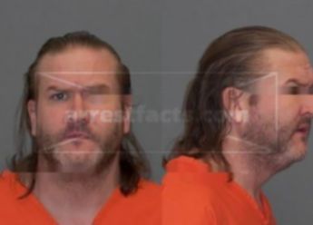 Travis John Holland