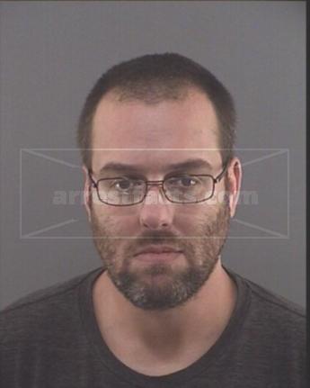 Matthew L Trader