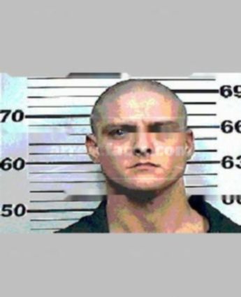 Travis J Whitener