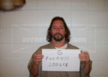 Gerald G Puckett