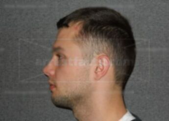 Travis W Bellows