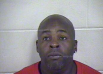 Travis L Cook