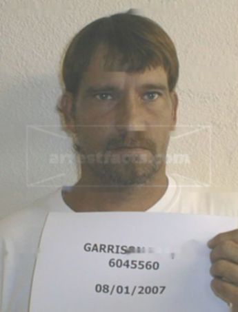 Tad D Garrison