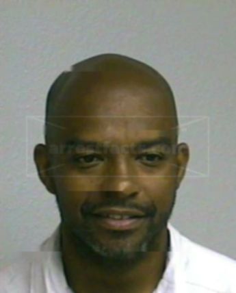 Darrin M Brewer