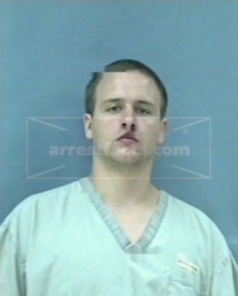 Travis J Merritt