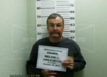 Melvin C Adams
