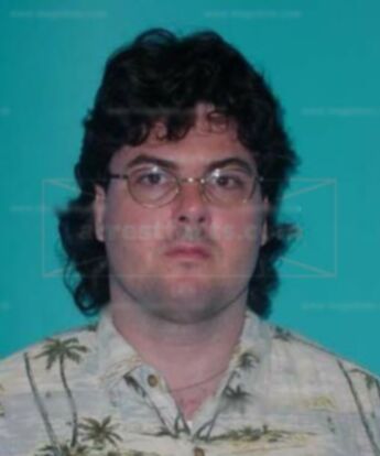 Joel A Troyer