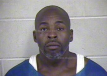 Travis L Cook