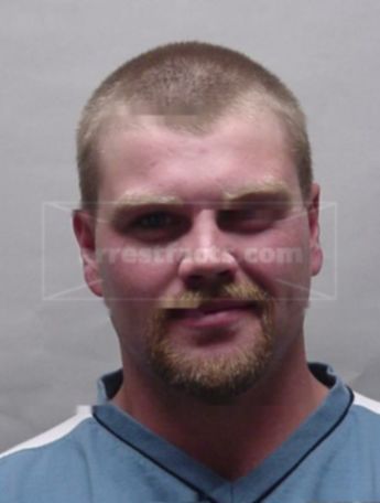 Travis J Furgason