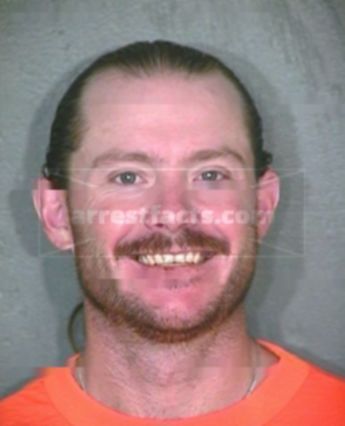 Travis L Barnes
