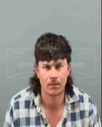 Troy L Rhoades
