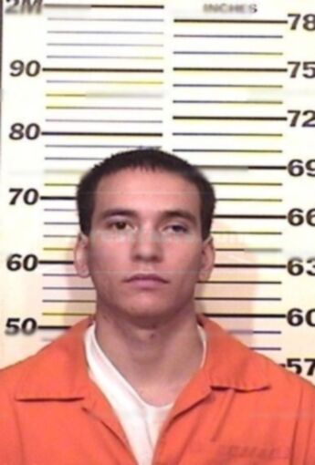 Zachary K Swisher