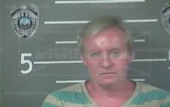 Greg W Tackett