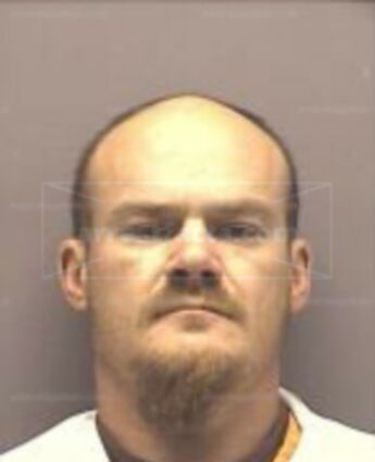 Travis John Carlson