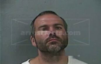 Travis J Burnett