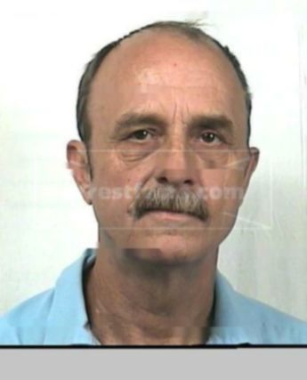 Howard L Mullins