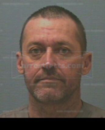 Travis L Wigington