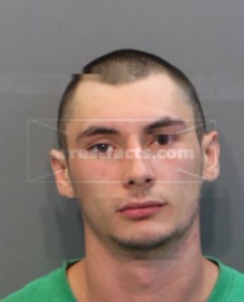 Zachary T Scott