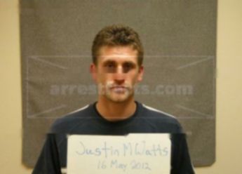 Justin M Watts