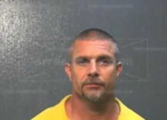 Harrell Charles E
