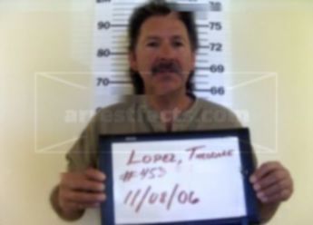 Theodore J Lopez