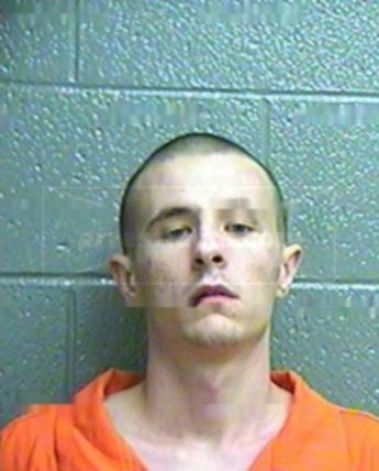 Justin L Cox